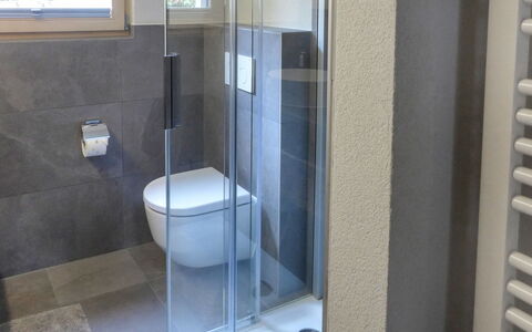 Papillon: Property, Bathroom, Room, Tile, Architecture, Plumbing Fixture, Glass, Floor, Door, Real Estate