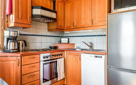 Ski and Camp Golf Casa Rocala: Kitchen, Kitchen Appliance, Major Appliance, Cabinetry, Countertop, Wood, Furniture, Flooring, Interior Design, Kitchen Sink
