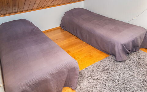 Ski and Camp Golf Casa Rocala: Floor, Flooring, Wood, Wood Flooring, Interior Design, Furniture, Textile, Room, Linens, Brown