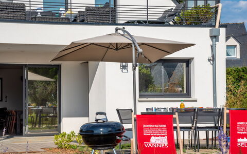 Villa Kerhostin: Umbrella, Roof, Awning, Building, Real Estate, Urban Area, House, Architecture, Home, Shade
