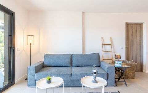 Porto Vecchio 116: Couch, Table, Furniture, Studio Couch, Interior Design, Wood, Flooring, Floor, Living Room, Curtain