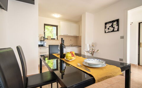 Erminia: Table, Furniture, Property, Building, Picture Frame, Chair, Interior Design, Couch, Living Room, Wood