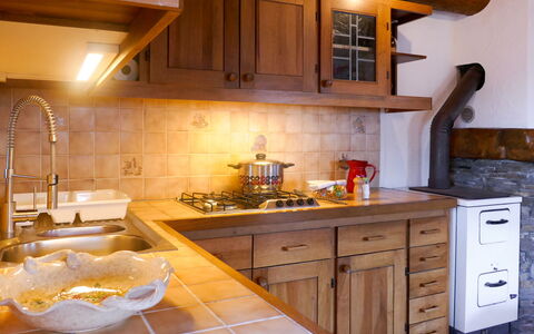 Rustico Catcüc: Countertop, Cabinetry, Kitchen, Room, Furniture, Property, Interior Design, Floor, Lighting, Sink
