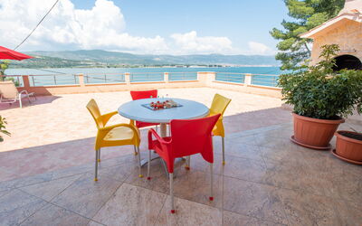 Trogir 182: Water, Table, Sky, Cloud, Furniture, Plant, Property, Chair, Azure, Outdoor Table