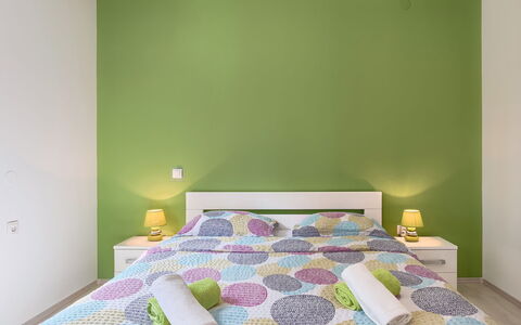 Villa Aniva: Room, Bedroom, Furniture, Green, Bed Sheet, Interior Design, Property, Purple, Bed, Wall