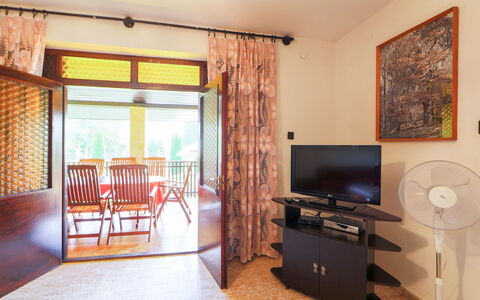 Akazie: Furniture, Property, Comfort, Building, Cabinetry, Wood, Television, Interior Design, Drawer, Lighting