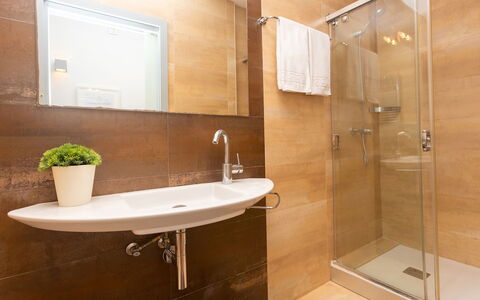 Centro: Passeig de Gracia - Casa Batllo: Brown, Tap, Plumbing Fixture, Mirror, Sink, Property, Plant, Shower Door, Bathroom, Building
