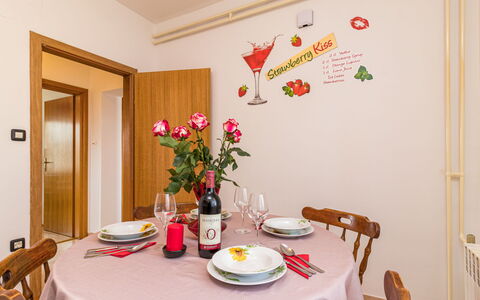 Pula 737: Room, Interior Design, Dining Room, Furniture, Table, Textile, Wallpaper, House, Tablecloth, Plant