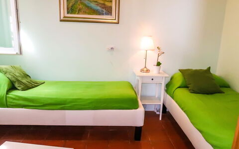 Paradise View: Furniture, Room, Green, Bedroom, Property, Bed, Interior Design, Bed Sheet, Bed Frame, Wall