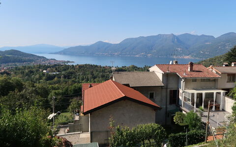 Colombaio: Sky, Plant, Property, Water, Mountain, Building, Tree, Highland, Natural Landscape, Land Lot