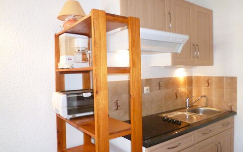 Pointe Vermeille: Furniture, Shelf, Room, Cabinetry, Property, Kitchen, Shelving, Interior Design, Countertop, House