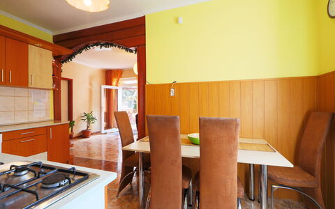 Beata: Room, Property, Furniture, Building, Interior Design, Real Estate, Ceiling, Yellow, House, Dining Room