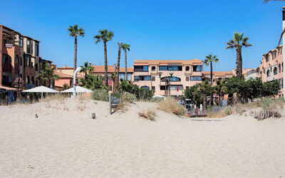 Le Barcarès 400: Sky, Building, Daytime, Property, Azure, Plant, Tree, Window, Beach, Arecales
