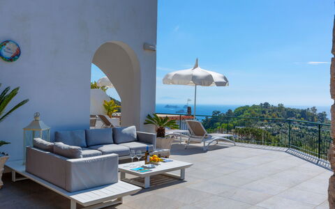 Villa Nerano: Furniture, Chair, Outdoor Furniture, Table, Flowerpot, Sea, Resort, Houseplant, Eco Hotel, Shade