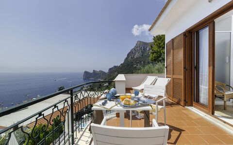Villa Nerano: Sky, Building, Table, Water, Cloud, Seaside Resort, Interior Design, Condominium, Wood, Chair
