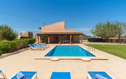 Can Butxet: Plant, Sky, Property, Daytime, Swimming Pool, Blue, Azure, Shade, Tree, Water