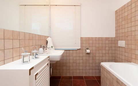 Villa Bugenvila: Brown, Plumbing Fixture, Property, Bathtub, Sink, Bathroom, Interior Design, Lighting, Architecture