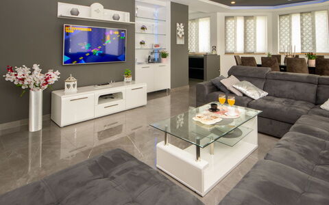 Oasis of Peace: Property, Couch, Television, Lighting, Living Room, Interior Design, Flooring, Table, Studio Couch, Floor