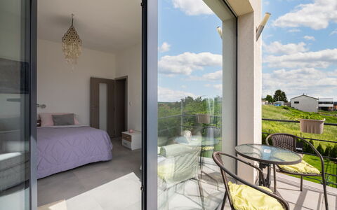 Lány: Cloud, Furniture, Property, Plant, Table, Building, Sky, Shade, Interior Design, Lighting