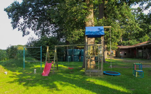 Sandbostel 601: Playground, Public Space, Outdoor Play Equipment, Grass, Tree, Human Settlement, Land Lot, Recreation, Park, Play