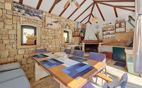 Brač Supetar 620: Furniture, Ceiling, Chair, Brick, Kitchen & Dining Room Table, Wood Stain, Light Fixture, Stone Wall, Beam, Living Room