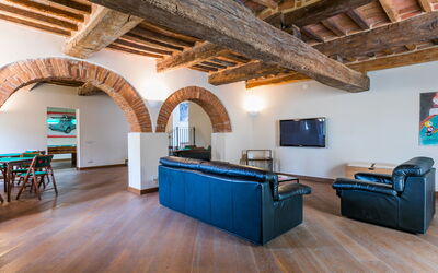 Villa la Guardia Vecchia 100.1: Furniture, Property, Couch, Wood, Hall, Interior Design, Flooring, Living Room, Floor, Chair