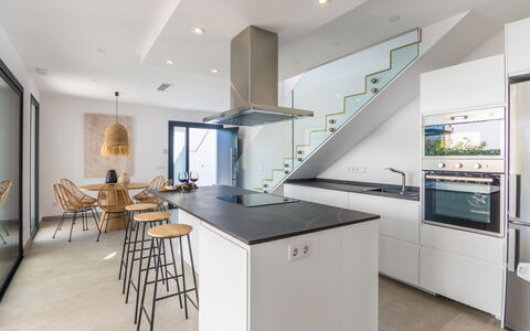 Ca Na Cati: Cabinetry, Furniture, Countertop, Building, Kitchen Appliance, Kitchen Stove, Kitchen, Table, Home Appliance, Wood