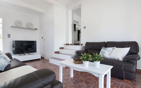 Estrella: Couch, Furniture, Table, Property, Building, Comfort, Picture Frame, Interior Design, Living Room, Wood