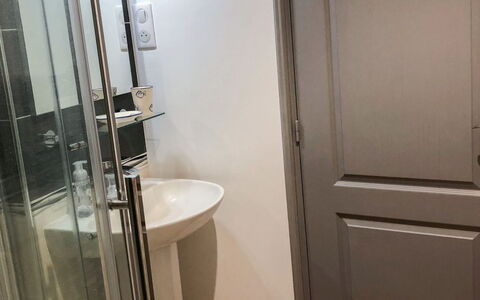 The Old Bakery: Plumbing Fixture, Door, Bathroom, Shower Door, Interior Design, Floor, Wood, Flooring, Cabinetry