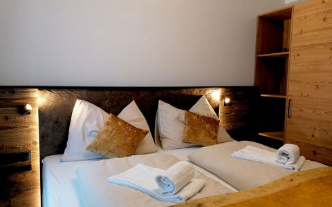 Rauris 110: Comfort, Wood, Floor, Flooring, Rectangle, Cabinetry, Shelf, Hardwood, Living Room, Pillow