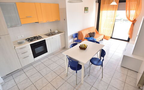 Vistamare: Property, Furniture, Table, Cabinetry, Chair, Kitchen Appliance, Building, Cooktop, Wood, Orange