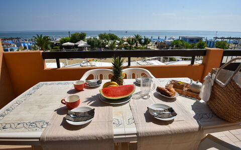 Vistamare: Food, Sky, Table, Tableware, Furniture, Property, Building, Water, Plant, Chair