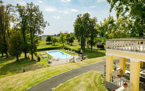 Zichy: Sky, Cloud, Plant, Building, Tree, Water, Land Lot, House, Swimming Pool, Urban Design