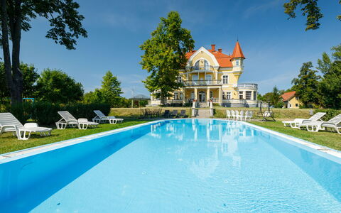 Zichy: Water, Sky, Plant, Swimming Pool, Building, Cloud, Tree, Azure, House, Leisure