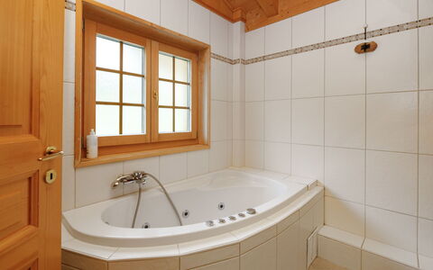 Dörfli: Bathtub, Plumbing Fixture, Bathroom, Flooring, Interior Design, Wood, Floor, Tap, Plumbing