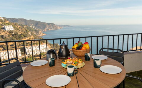Seaview Salions: Table, Sky, Tableware, Cloud, Furniture, Property, Chair, Flowerpot, Water, Food