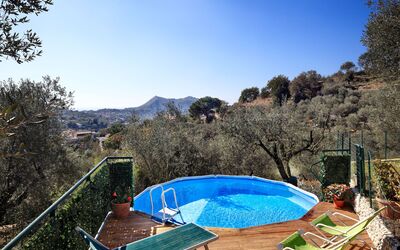 La Villa Dell'olio: Sky, Water Resources, Water, Mountain, Leaf, Azure, Plant, Swimming Pool, Tree, Natural Landscape
