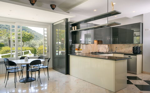 Villa Antonietta: Cabinetry, Furniture, Countertop, Property, Table, Building, Chair, Kitchen, Wood, Lighting