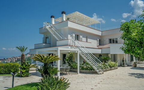 Villa Antonietta: Sky, Plant, Property, Building, Window, Cloud, Tree, Residential Area, House, Door