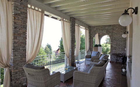 Villa Ermelinda: Plant, Property, Shade, Building, Interior Design, Chair, Curtain, Living Room, Houseplant, Window