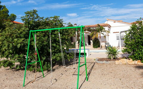 Villa del Capitan: Cloud, Sky, Plant, Shade, Land Lot, Building, Tree, Grass, Playground, Leisure