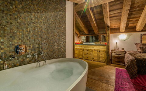 Denali: Bathtub, Cabinetry, Lighting, Bathroom, Interior Design, Plumbing Fixture, Tap, Wood, Flooring, Floor