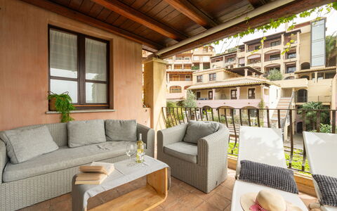 Rokkaria: Furniture, Property, Plant, Couch, Flowerpot, Houseplant, Building, Table, Interior Design, Window
