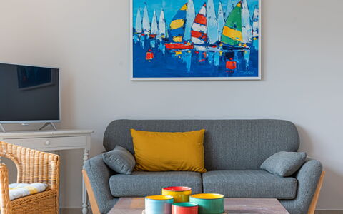 Le Ponant: Table, Picture Frame, Furniture, Couch, Blue, Rectangle, Textile, Orange, Building, Interior Design