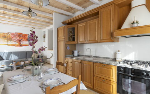 Casa 51: Cabinetry, Property, Furniture, Table, Countertop, Interior Design, Wood, Flooring, Architecture, Floor