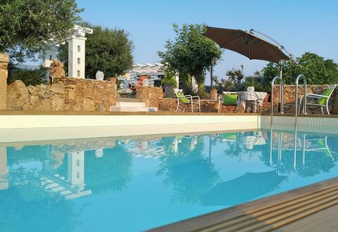 Villa Giunone: Swimming Pool, Property, Water, Real Estate, Umbrella, Azure, Aqua, Reflection, Resort, Shade