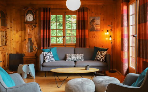 Chalet les Rochers Blancs: Furniture, Property, Table, Light, Comfort, Picture Frame, Building, Wood, Window, Lighting