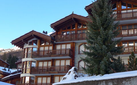 Shangri la: Sky, Window, Building, Snow, Tree, Residential Area, Neighbourhood, Urban Design, Real Estate, Facade