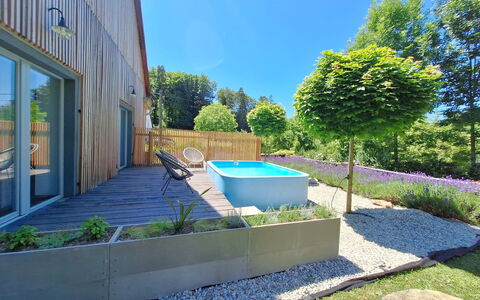 Brníčko: Garden, Shrub, Composite Material, Backyard, Landscaping, Shade, Swimming Pool, Yard, Eco Hotel, Lawn