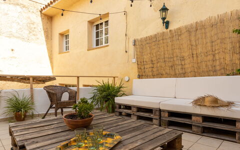 Cal Juan: Plant, Table, Building, Property, Window, Furniture, Flowerpot, Flower, Wood, Outdoor Furniture
